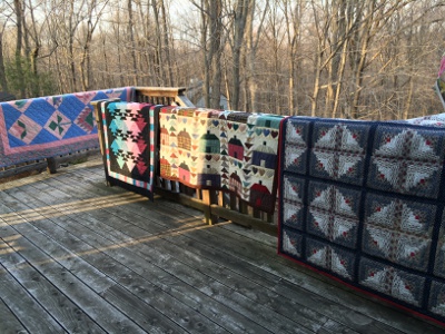 Four Habitat Quilts getting their spring airing out